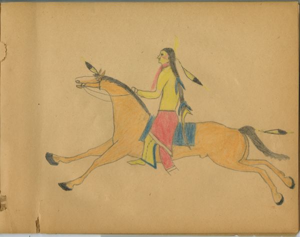 Man in yellow shirt with red kerchief riding tan horse