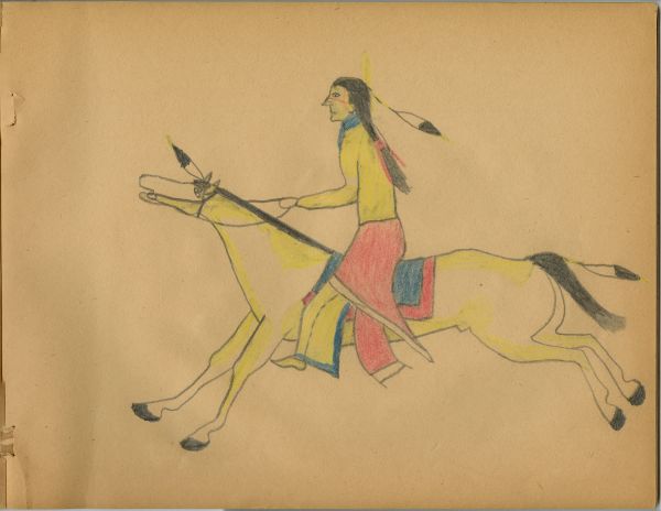 Man in yellow shirt and blue kerchief galloping on yellow pinto