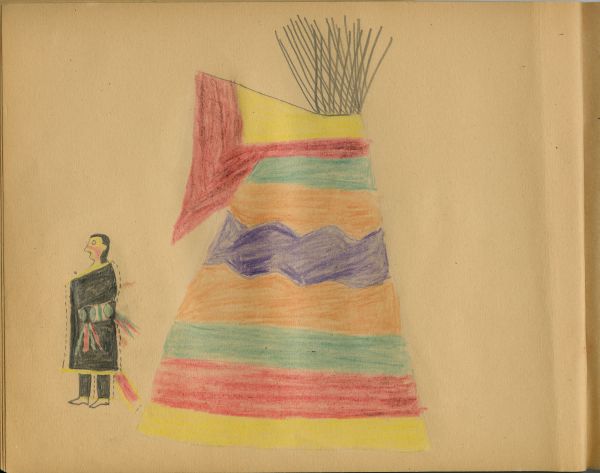 Man in blanket with blanket stripe in front of rainbow tipi